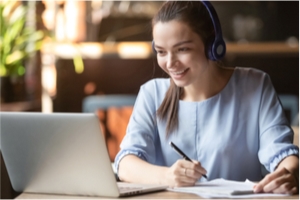 A seller works through a self-paced online module of SCOTSMAN Sales Training 